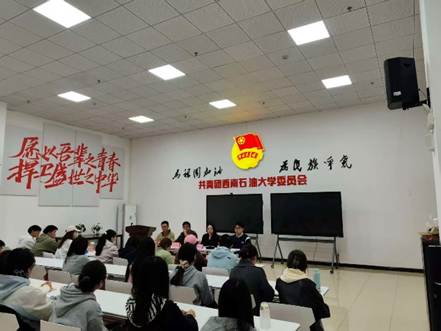 A group of people sitting at desks in a classroom AI-generated content may be incorrect.